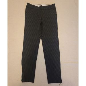 Womens striped trouser pant Size M with zippers at ankle. Black and white